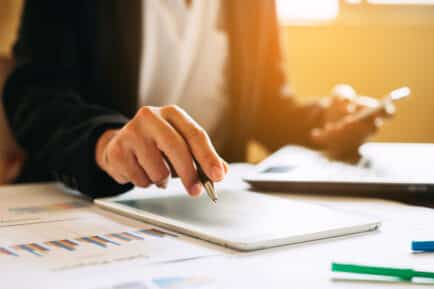 Woman working on report